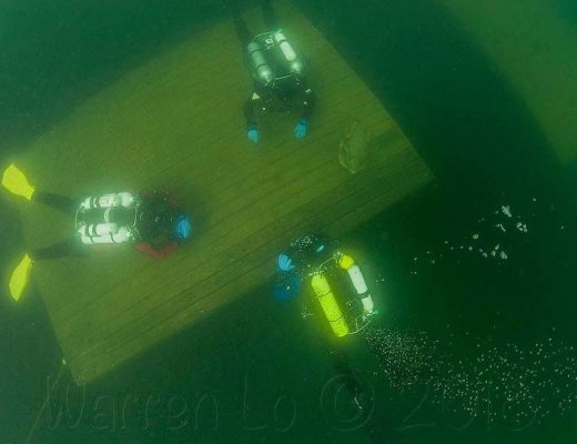 Three Divers Underwater